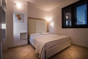 Letto o letti in una camera di Case di Torre Pali