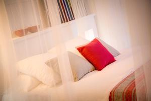 A bed or beds in a room at Blue Home