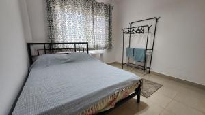Postel nebo postele na pokoji v ubytování Modern apartment with private garden Madinaty + 7 fotografií