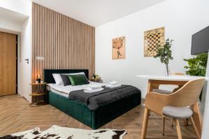 Posteľ alebo postele v izbe v ubytovaní NovaNest Apartments - Kalwaryjska - by Upstairs