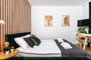 Posteľ alebo postele v izbe v ubytovaní NovaNest Apartments - Kalwaryjska - by Upstairs
