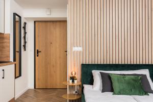 Posteľ alebo postele v izbe v ubytovaní NovaNest Apartments - Kalwaryjska - by Upstairs + 37 fotografií