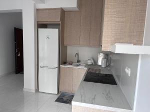 Kuchyň nebo kuchyňský kout v ubytování Piraeus new hotel