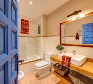Een badkamer bij Blue Home