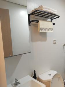 Koupelna v ubytování C516 Place at SMDC Cheer Residences by Lee Portum