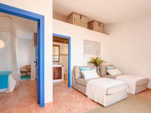 A bed or beds in a room at Blue Home
