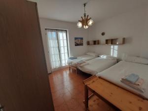 Posteľ alebo postele v izbe v ubytovaní Apartment Pineta dell'Alben
