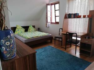 Posteľ alebo postele v izbe v ubytovaní Angi apartman