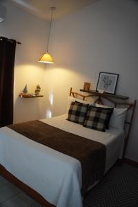 Uma cama ou camas num quarto em Hotel Montesilva