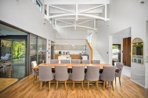 a dining room with a table and chairs at 19 Hillside Lane, Dunkirk Estate in uMhlali
