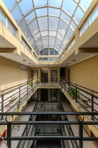 arium of a building with a glass ceiling at Daisy Hotel in Addis Ababa