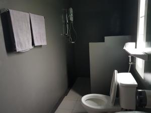 Koupelna v ubytování ภูรักษ์รีสอร์ท บ้านกรูด