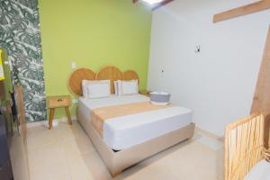 Postel nebo postele na pokoji v ubytování La Casona Hotel Boutique