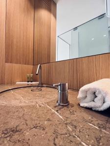 a bathroom with a sink and a mirror at Casabell 3 Caminito del Rey in Valle de Abdalagís