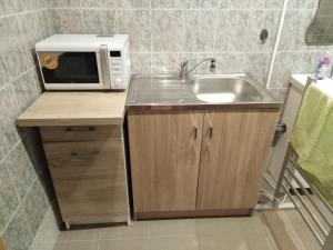 A kitchen or kitchenette at Apartmany Fantagiro