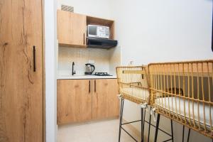 Kuchyň nebo kuchyňský kout v ubytování La Casona Hotel Boutique