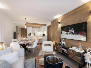 Khu vực ghế ngồi tại Appartement neuf 76m², Courchevel Village, 2 pas des pistes, 6 couchages, parking inclus - FR-1-562-53