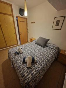 Llit o llits en una habitació de Apartamento Trilo 24