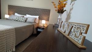 Cama o camas de una habitación en CASA JOSE "Acogedor Apartamento cerca de la playa"