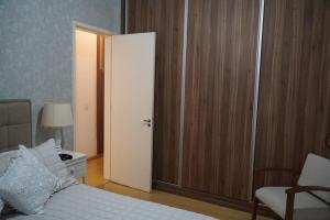 Tempat tidur dalam kamar di Belfort Roxo,266