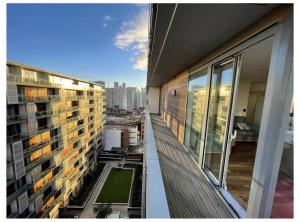 a balcony of a building with a view of the city at Modern Double Room in Manchester