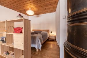 Postel nebo postele na pokoji v ubytování Chasa Curasch