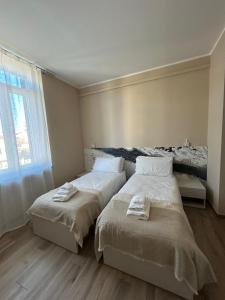 Postel nebo postele na pokoji v ubytování Breccia Nel Mare