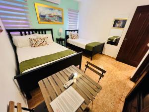 Postel nebo postele na pokoji v ubytování Suite Colonial by Cristi