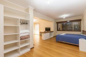 Postel nebo postele na pokoji v ubytování Hotel Letto Caxias