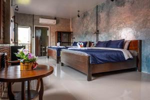 Katil atau katil-katil dalam bilik di Smilingface guesthouse
