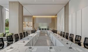 a conference room with rows of tables and chairs at Argyle Grand Hotel Nairobi Airport in Nairobi