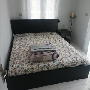 Postel nebo postele na pokoji v ubytování Πολυστάφυλο Πρεβέζης