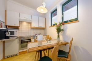 Kuchyň nebo kuchyňský kout v ubytování Appartement Viehhauser