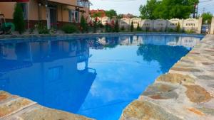 Bazén v ubytování Giandra Resort nebo v jeho okolí