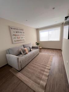 Et opholdsområde på El Golf los inkas luxury Penthouse