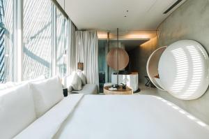 Katil atau katil-katil dalam bilik di 了了礁溪 Vivir Jiaoxi Hotel