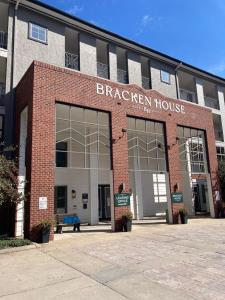 a brick building with a bracer house written on it at Home Street at Bracken House in Pittsburgh