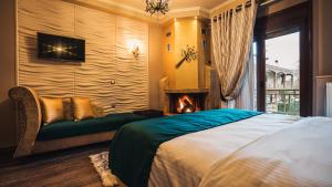 Postel nebo postele na pokoji v ubytování Eliton Hotel & Spa