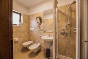 Koupelna v ubytování Suàn Hotel