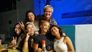 a group of people posing for a picture at Villa on The Beach Seaside Sunrise Haven 7 bedroom in Cancún