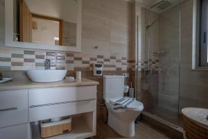 Koupelna v ubytování Mythos Villas