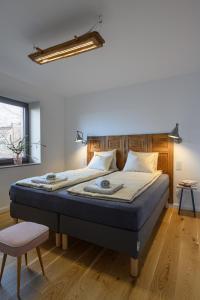 Ένα ή περισσότερα κρεβάτια σε δωμάτιο στο LUBLIN RESIDENCE Apartamenty z klimatem, ogród, parking