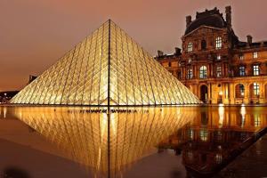 an image of the louvre pyramid in front of a building at Au Bord du Canal 4A *Gare*Paris*Disney* in Chelles