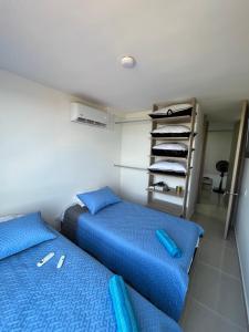 Postel nebo postele na pokoji v ubytování Apto de lujo. Ricaurte-Girardot