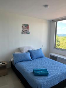 Postel nebo postele na pokoji v ubytování Apto de lujo. Ricaurte-Girardot