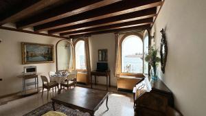a living room with a view of the water at San Simeon Apartments in Venice