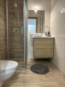 Kúpeľňa v ubytovaní Villa pod Skrzycznem