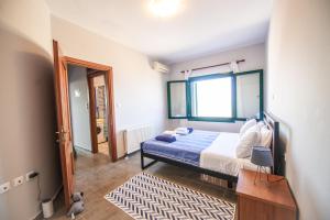 Postel nebo postele na pokoji v ubytování Villa Alcor - Kokkino Chorio + 46 fotografií