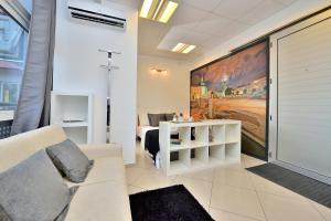 Posezení v ubytování Che Room + 10 fotografií