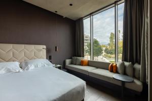 Postel nebo postele na pokoji v ubytování Hotel VIU Milan, a Member of Design Hotels